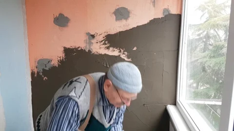 Forming of smooth hard surface on walls Stock Footage 104418564