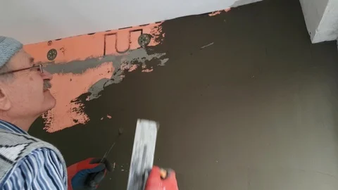 Forming of smooth hard surface on walls Stock Footage 104504570