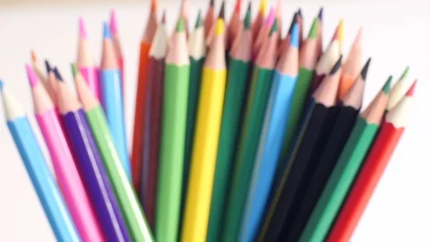 Forming a stack of colorful pencils Stockbeeldmateriaal 70376704