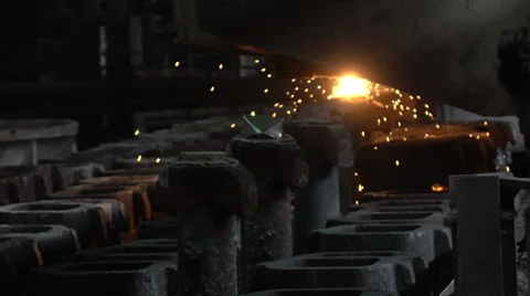 Forms are filled with hot metal Stock Footage 61940570