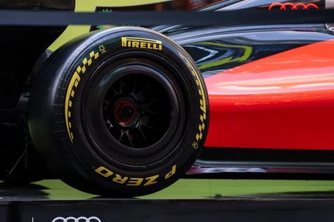 Formula 1 car wheel close-up with Pirelli tire Stock Photos