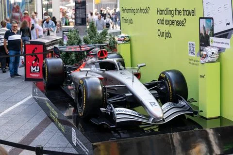 Formula 1 display in Times Square with crowd Stock Photos