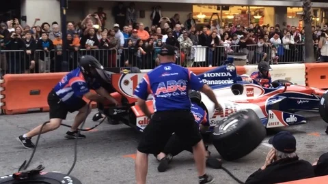 Formula car making pit stop slow Stock Footage 102821180