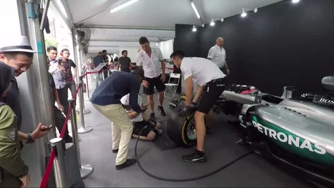 Formula One Car Racing, Petronas Pit Stop presentation, Wheel change, Malaysia Stock Footage 166266840