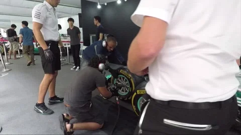 Formula One Car Racing, Petronas Pit Stop presentation, Wheel change, Malaysia Stock Footage 166268600