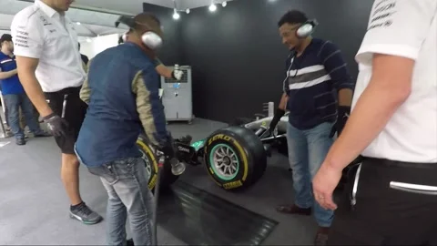 Formula One Car Racing, Petronas Pit Stop presentation, Wheel change, Malaysia Stock Footage 166269342