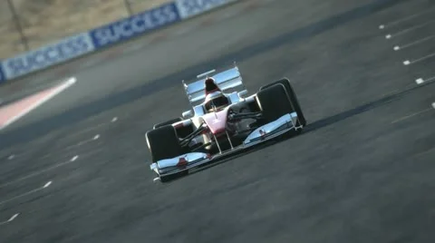 Formula one race car on desert circuit - finish line Stock Footage
