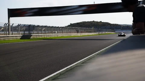 Formula one racing car driving on a racetrack Stock Footage 150961603
