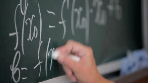 Formula written on blackboard with chalk Stock Footage 53860811