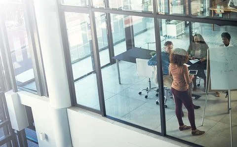 Formulating new ways to do business. High angle shot of a group of Stock Photos