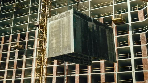 Formwork for creating reinforced concrete slabs lifted on a crane Stock Footage 271329144