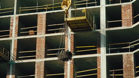 Formwork for creating reinforced concrete slabs lifted on a crane Stock Footage 271329389