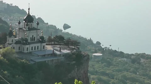 Foros Church under sun rays on the precipice of a mountain Ai-Petri Vídeo Stock 41387736