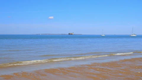 Fort boyard and sandy beach of Boyardville on a sunny day Stock Footage 279837408
