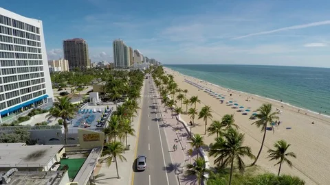 Fort Lauderdale Beach & Road Aerial Fly north Stock Footage
