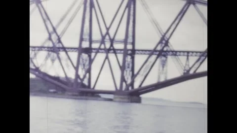 Forth rail bridge crossing in 1960s scotland Stock Footage 309450132