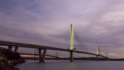 Forth Road Bridge and Queensferry Crossing over Firth of Forth from Edinburgh Video stock 102138306