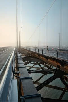 Forth Road Bridge covered in thick fog in the early morning Stock Photos