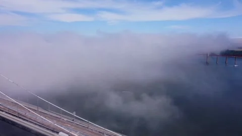 The Forth road bridge in Scotland under fog Stock Footage 337238394