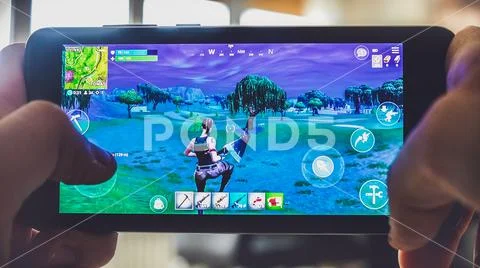 Fortnite gameplay battle royale game smartphone Stock Photos