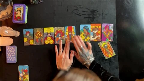 Fortune Teller arranging her cards Stock Footage 249837412