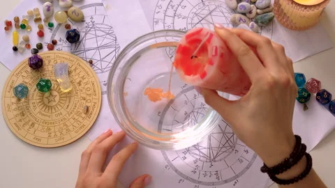 Fortune teller with candle wax. Selective focus. Stock Footage 304536741
