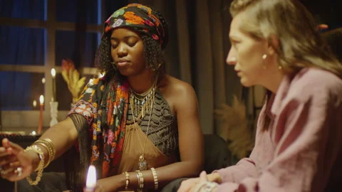Fortune Teller Communicating with World of Spirits when Holding Pendulum Stock Footage 247629765