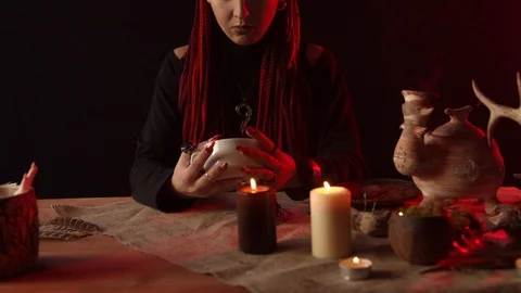Fortune teller with cup of coffee predicting future Stock-Footage 125024894