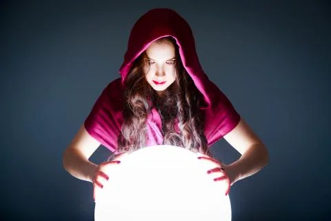 Fortune Teller Looking in a Magic Crystal Ball Stock Photos
