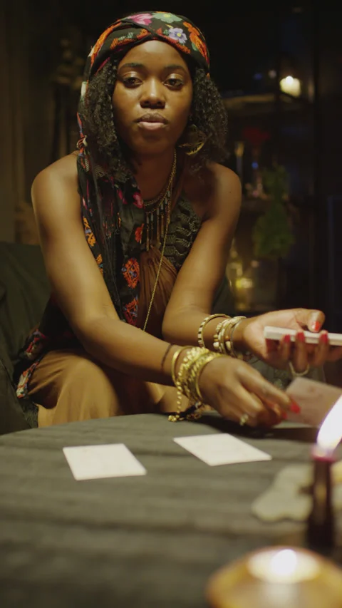 Fortune Teller Making Tarot Layout on Table Stock Footage 247628638