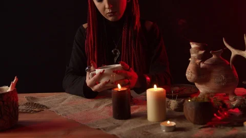 Fortune teller with predicting future by coffee grains Stock Footage 123960932