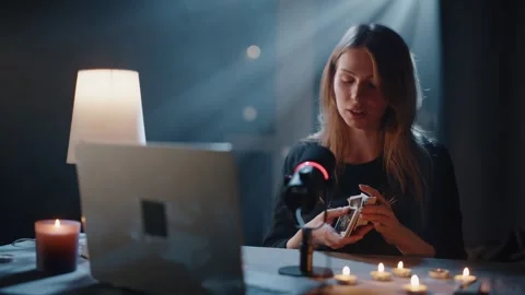 The Fortune Teller Speaks Into the Microphone Vídeos de archivo 306015981