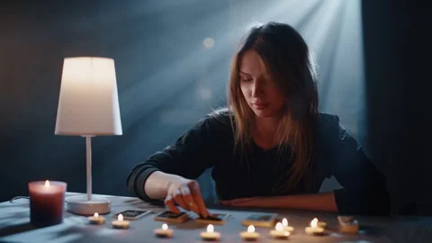 Fortune-Teller at the Table by Candlelight Wonders on Cards 스톡 동영상 295313564