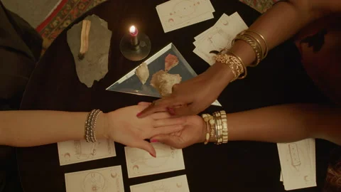 Fortune Teller Tracing Lines on Palm of Client on Session of Future Predicitng Stock Footage 247641865