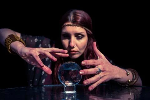 Fortune teller using crystal ball Stock Photos