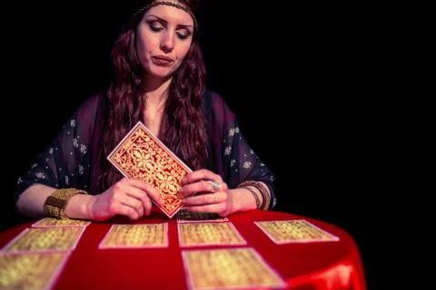 Fortune teller using tarot cards with eyes closed Foto stock