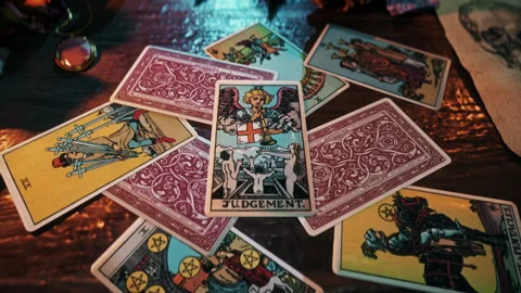 Fortune-telling divination spell predicting spiritual Judgement using a card Stock Footage 250779633