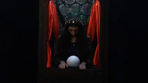 Fortune telling machine starts working, woman opens up her eyes Stock Footage 101369771