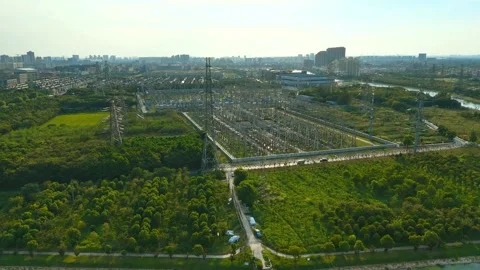 Forward Aerial Approach to High-Voltage Substation in Shanghai Stock Footage 342145525