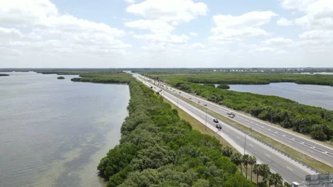 Forward aerial down the Sunshine Skyway Tollway outside, Tampa, Florida Stock Footage 154940924
