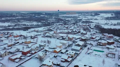 Forward aerial drone flight over winter housing area Video stock 323576218