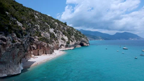 Forward Aerial Drone Flyover of Cala Luna Coastline –  Sardinia Stock Footage 313549080