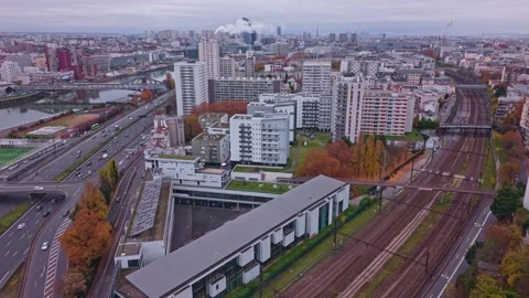 Forward Aerial Drone Shot Over Railway Lines and Paris Beltway Toward Cityscape Stock Footage 323375344
