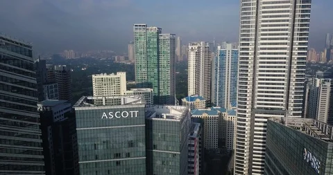 Forward aerial flight above high rise building revealing urban area. Stock-Footage 130157720