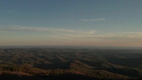Forward aerial track sunset over mountains. 스톡 동영상 229668874