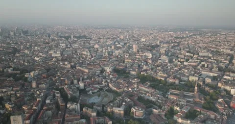 Forward Aerial View Over Navigli Toward Central Milan and Torre Velasca Stock Footage 344470309