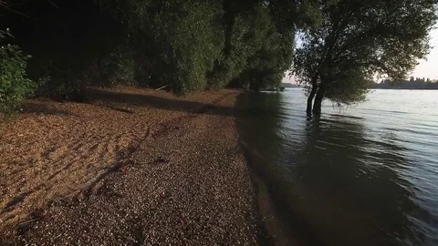 Forward aerial view over the riverside Stock Footage 70758638