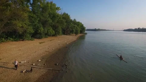 Forward aerial view over the riverside Stock Footage 70759076