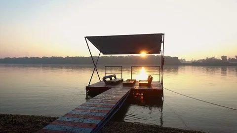 Forward aerial view over the riverside Stock Footage 70759264