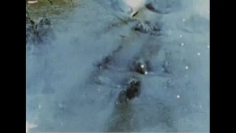 Forward air controllers drop a bomb on landscape during war - 1968 Stock Footage 99913149